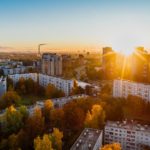 aerial-view-of-white-concrete-buildings-during-golden-hours-681368
